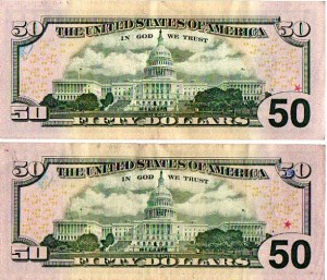 marked Fifty dollar bills