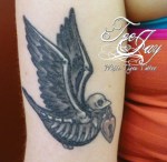 skeleton traditional bird tattoo