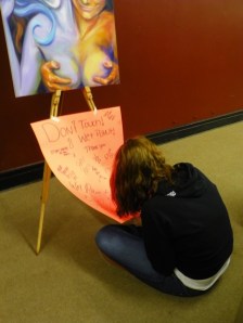 Jess making wet paint sign