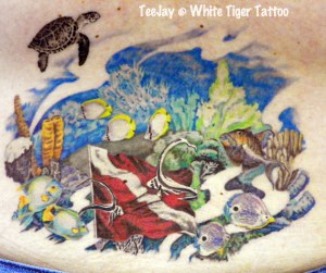 Underwater diver down coral reef tattoo