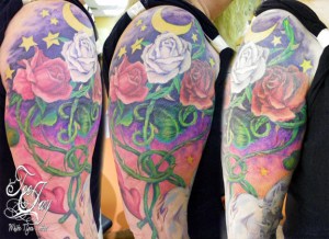 Woman tattoo sleeve - stars roses and love