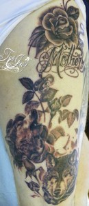 wolf rose vine tattoo