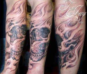 skull flames tattoo