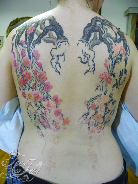 cherry blossom wing tattoo