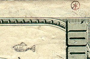 fish stamp on 100 bill