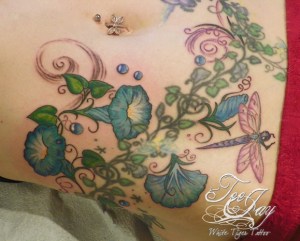 tattoo of morning glories and dragonfly