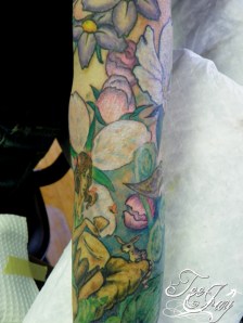 flowers and ring tailed woozle tattoo