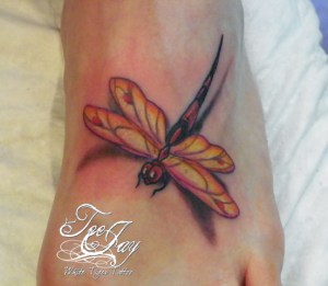 dragonfly tattoo on foot