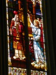 stained glass of Moses receiving Commandments