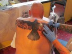 crow tattoo in progress