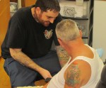 Joe Caiazza tattooing
