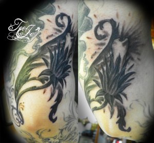 tooth thistle tattoo