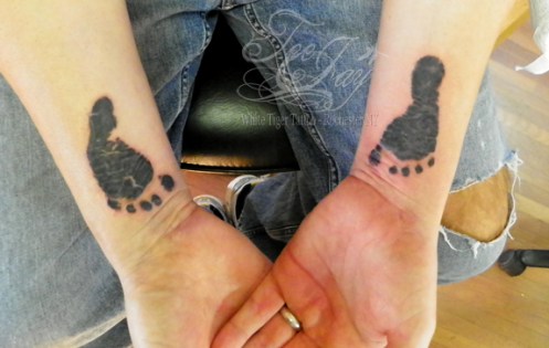 foot print tattoos