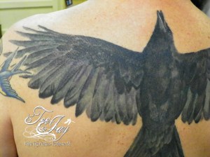 crow tattoo detail