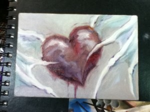 heart with white bat wings