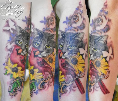 tattoo of cat and cardinal