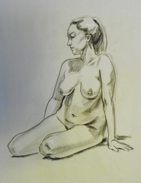 female figure sitting