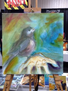 wip oil painting bird on hand