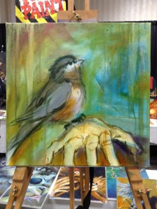 wip oil painting bird on hand