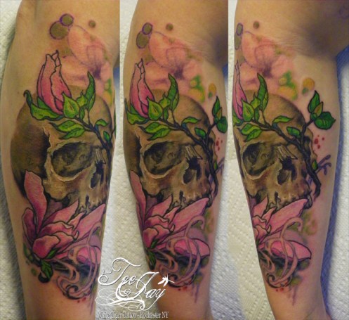 Skull with Magnolias tattoo