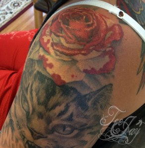 Painting the Roses Red tattoo