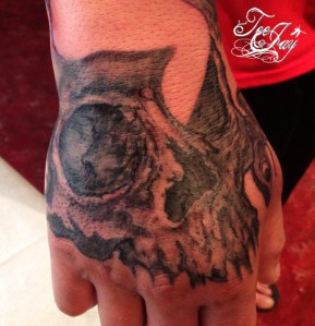 Hand Skull tattoo