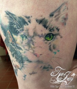 double exposed kitty tattoo