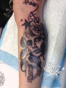 sugar skull memorial tattoo