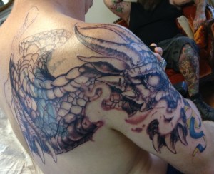 dragon coverup tattoo