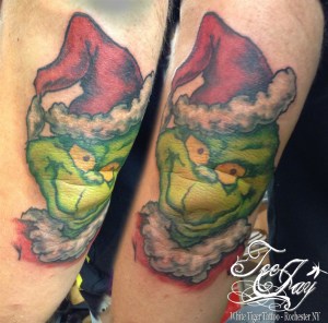 Grinch Tattoo on elbow