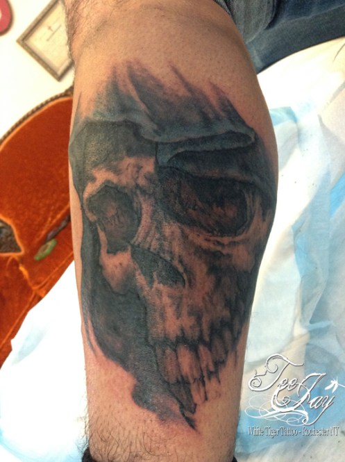 Shirley tattoo cover-up with skull