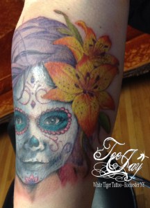 sugar skull tattoo of daughter