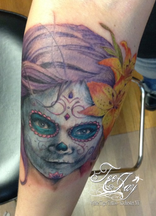 Portrait tattoo of daughter as sugar skull