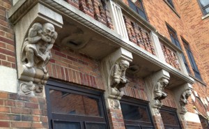 row of reading gargoyles