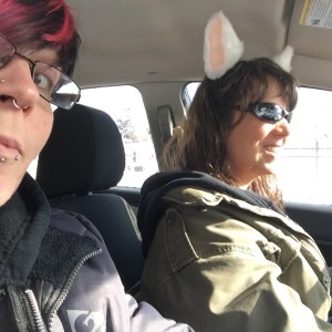 TeeJay driving with ears on