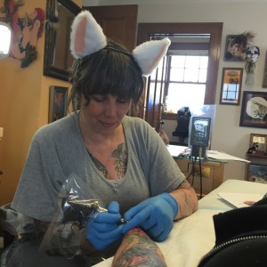 TeeJay tattooing with necomimi