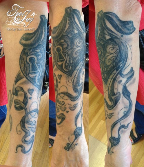 healed heart locket tattoo