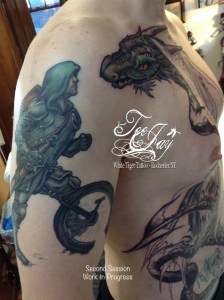 mountain unicycle tattoo in progress