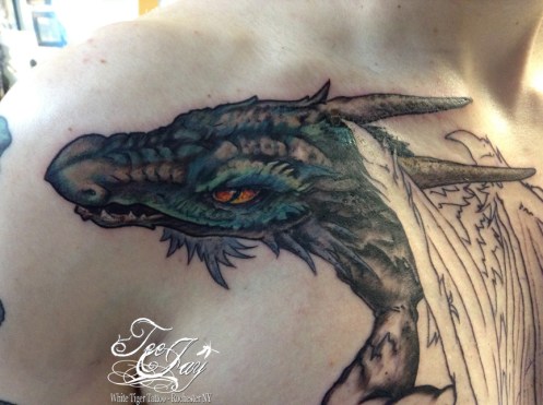 mountain unicycle tattoo dragon