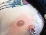 extra nipple tattoo