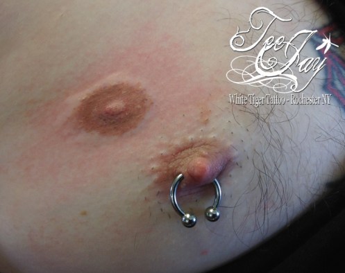 extra nipple tattoo