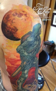 full moon and mountain unicycle knight tattoo