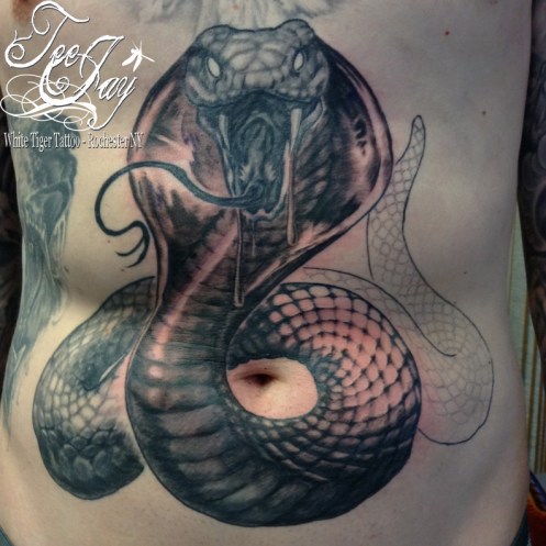 stomach cobra tattoo