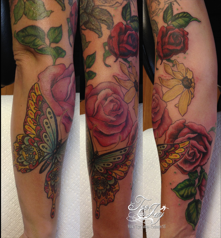 sugar skull butterfly tattoo with roses
