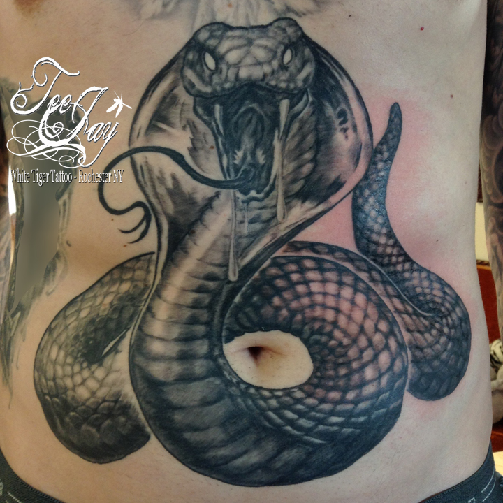 stomach snake tattoo