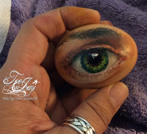 eye painted on egg