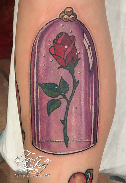 enchanted rose tattoo