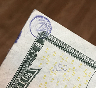 ASc stamp on $20