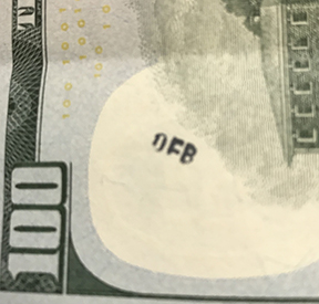 DFB stamp on $100 bill
