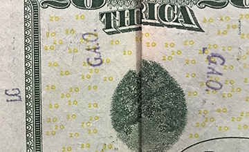 LG stamp - G.A.O. stamp on $20